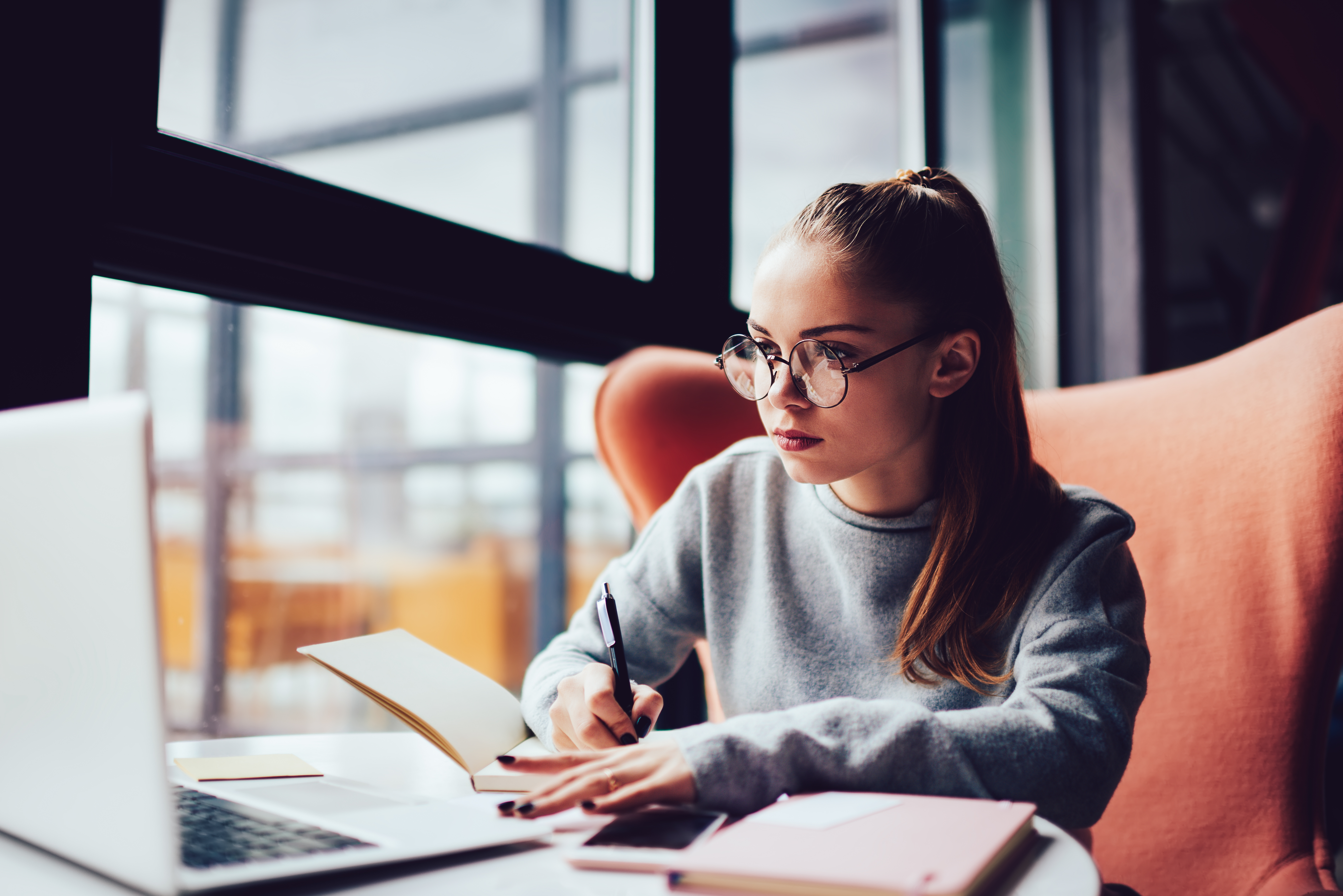 Young female student studying.